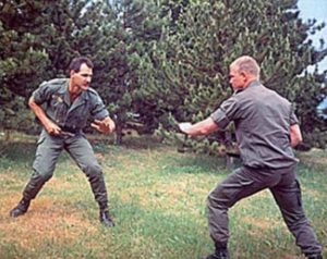 A picture showing Warriors Krav Maga Online instructor Nick Hughes when he was in the Foreign Legion practicing unarmed combat